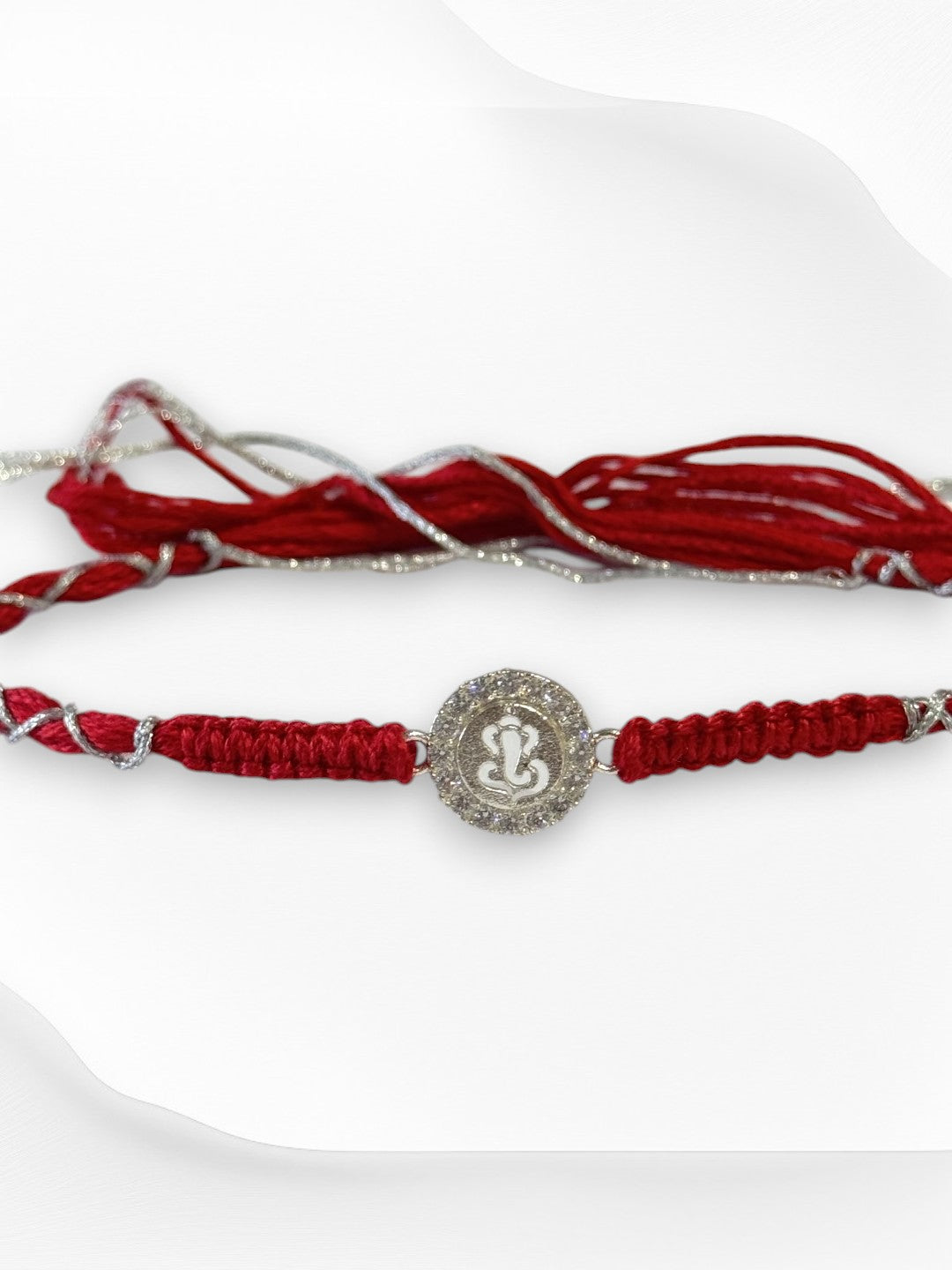 DIAMOND GANESHA TARINI PURE SILVER RAKHI