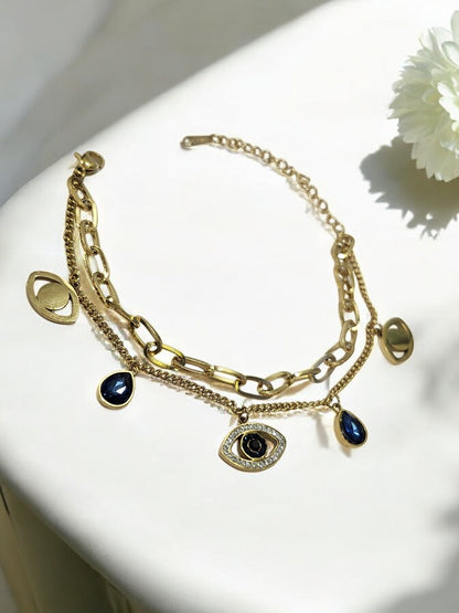 GOLDEN LAYER CHAIN WITH HANGING CHARMS LIKE BLUE DROP DIAMOND EVIL EYE AND TINY SHINY DIAMOND
