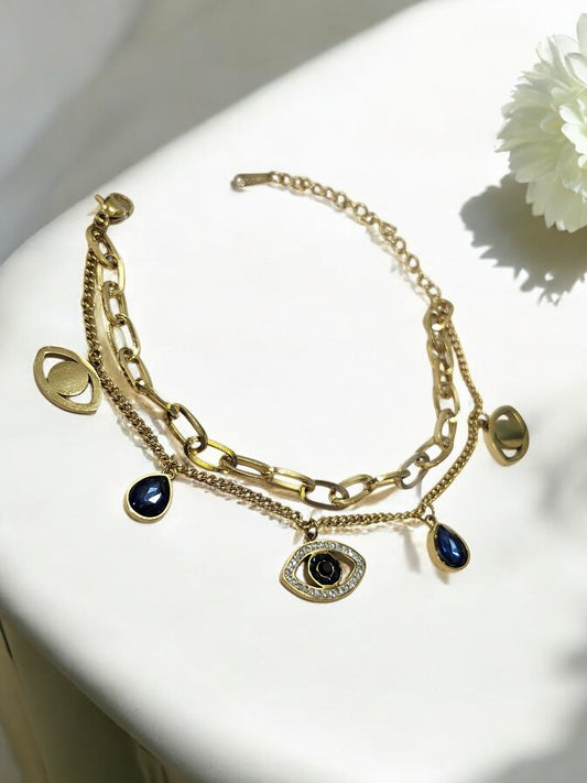 GOLDEN LAYER CHAIN WITH HANGING CHARMS LIKE BLUE DROP DIAMOND EVIL EYE AND TINY SHINY DIAMOND