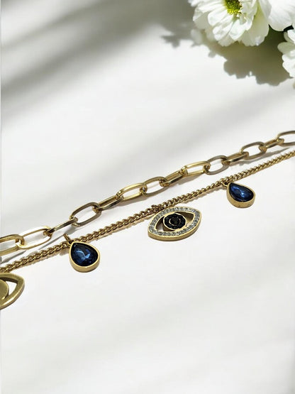 GOLDEN LAYER CHAIN WITH HANGING CHARMS LIKE BLUE DROP DIAMOND EVIL EYE AND TINY SHINY DIAMOND