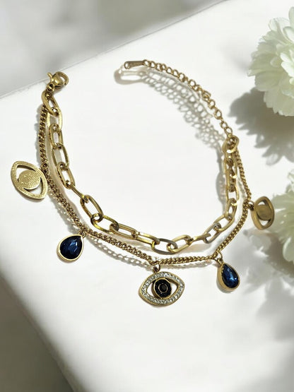 GOLDEN LAYER CHAIN WITH HANGING CHARMS LIKE BLUE DROP DIAMOND EVIL EYE AND TINY SHINY DIAMOND