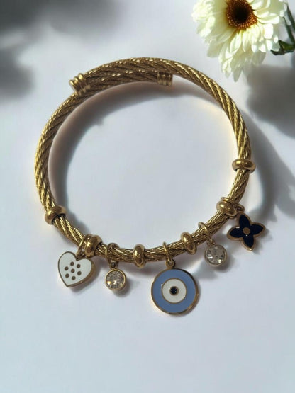 GOLDEN AIRA CHARMS BRACELET