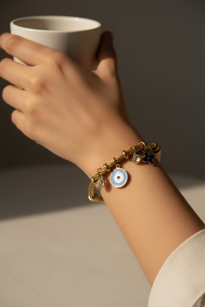 GOLDEN AIRA CHARMS BRACELET