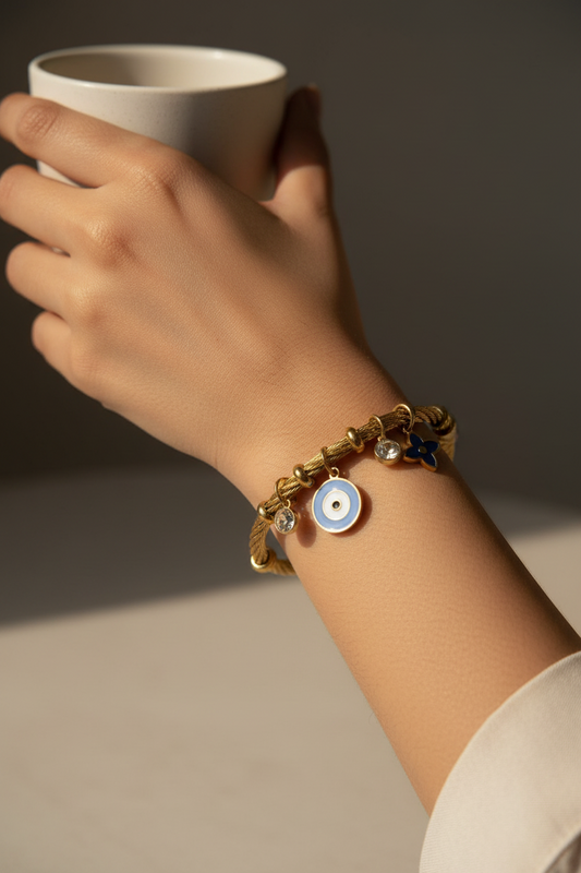 GOLDEN AIRA CHARMS BRACELET