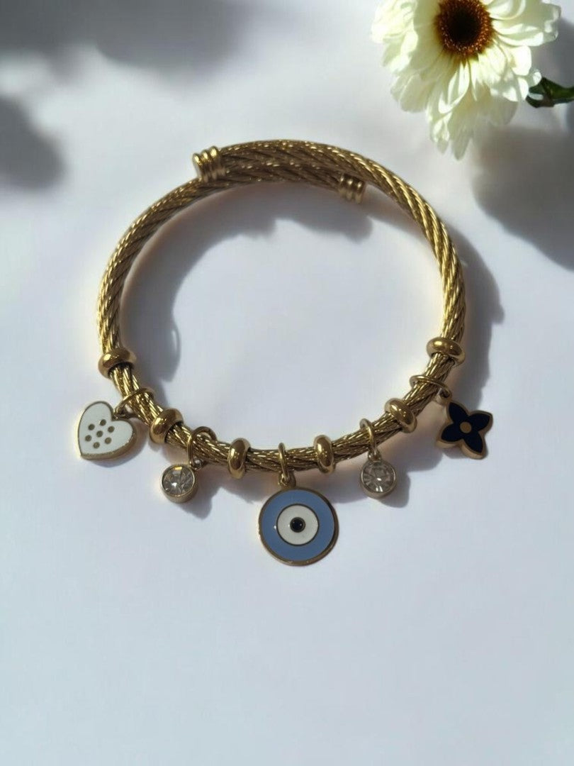 GOLDEN AIRA CHARMS BRACELET