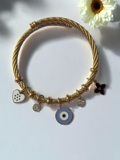 GOLDEN AIRA CHARMS BRACELET