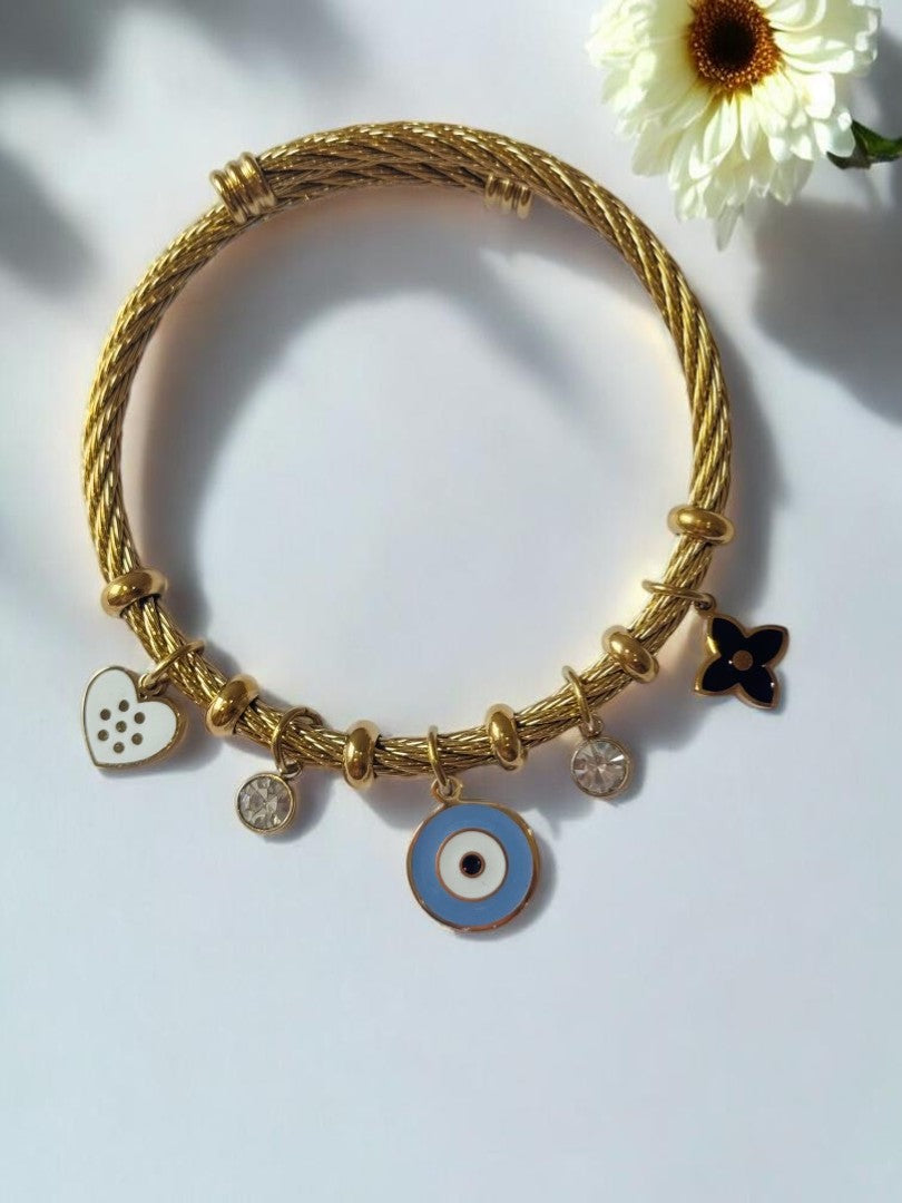 GOLDEN AIRA CHARMS BRACELET