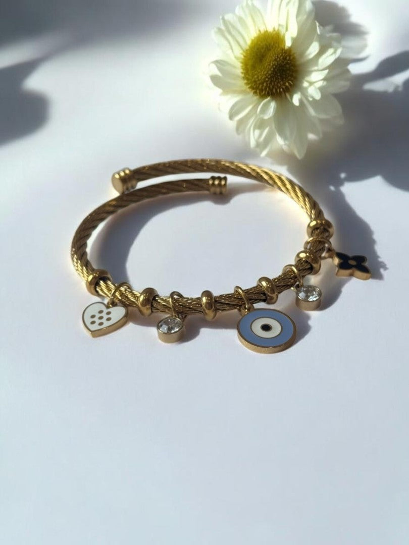 GOLDEN AIRA CHARMS BRACELET