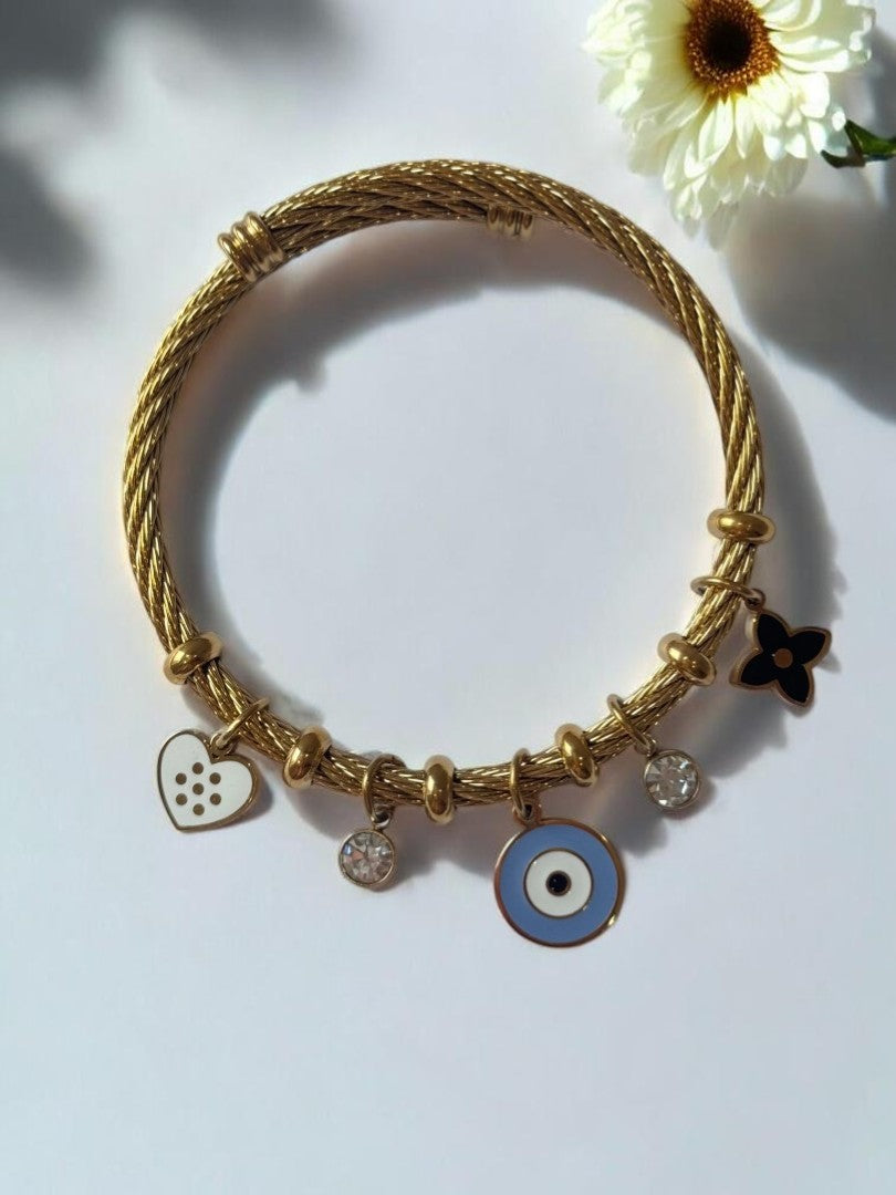 GOLDEN AIRA CHARMS BRACELET