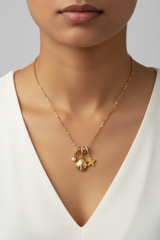 GOLDEN OCEAN CHARMS RIELLA NECKLACE