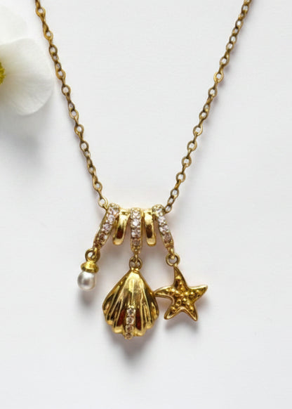 GOLDEN OCEAN CHARMS RIELLA NECKLACE