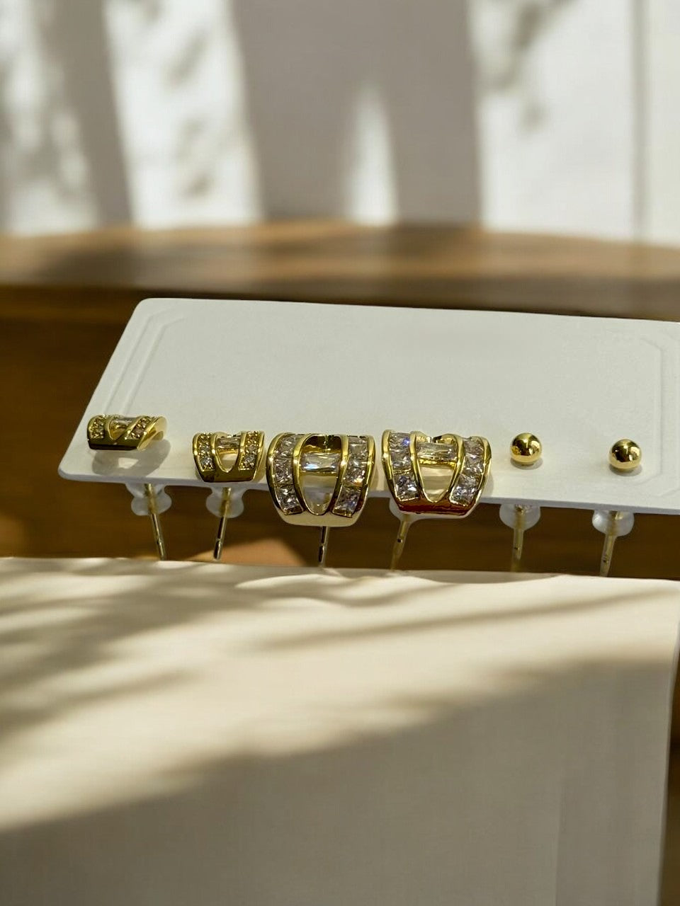THREE PAIR OF EARRINGS
