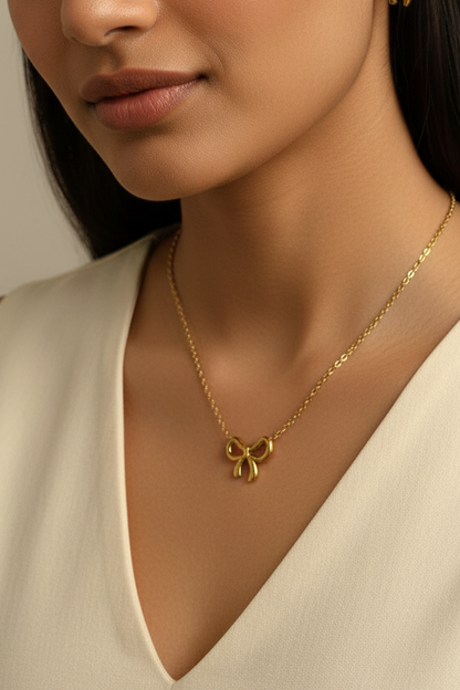 GOLDEN BOW DARLA NECKLACE