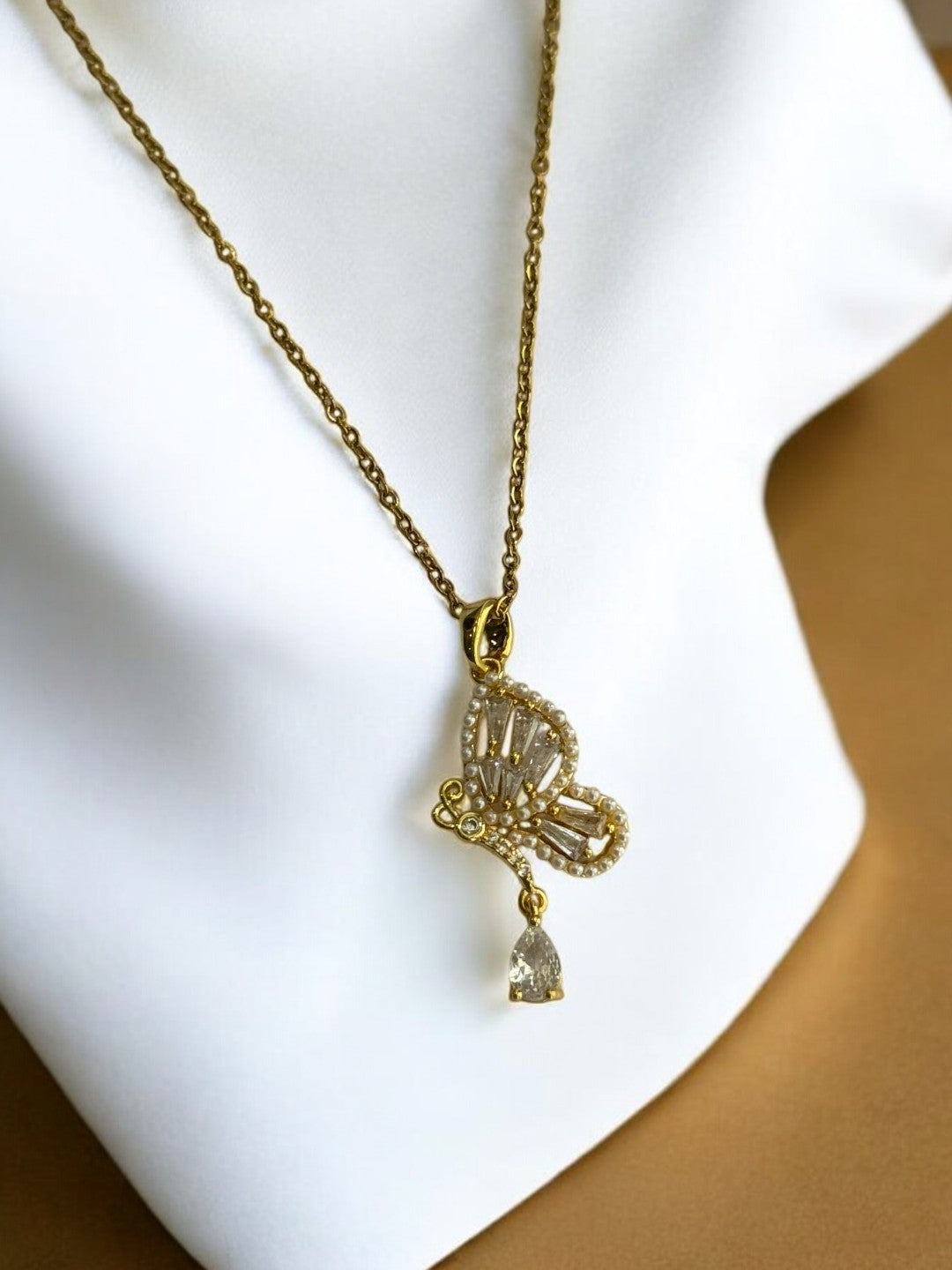 GOLDEN CHAIN WITH DIAMOND BUTTERFLY PENDENT