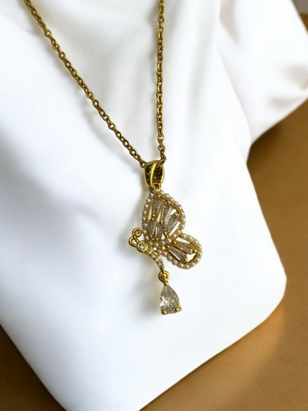 GOLDEN CHAIN WITH DIAMOND BUTTERFLY PENDENT