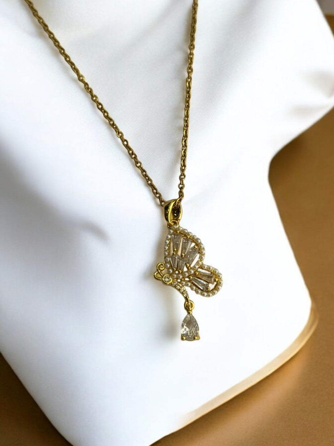 GOLDEN CHAIN WITH DIAMOND BUTTERFLY PENDENT