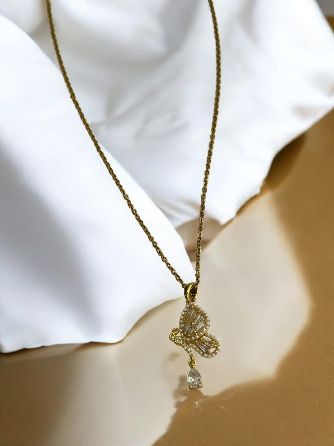 GOLDEN CHAIN WITH DIAMOND BUTTERFLY PENDENT