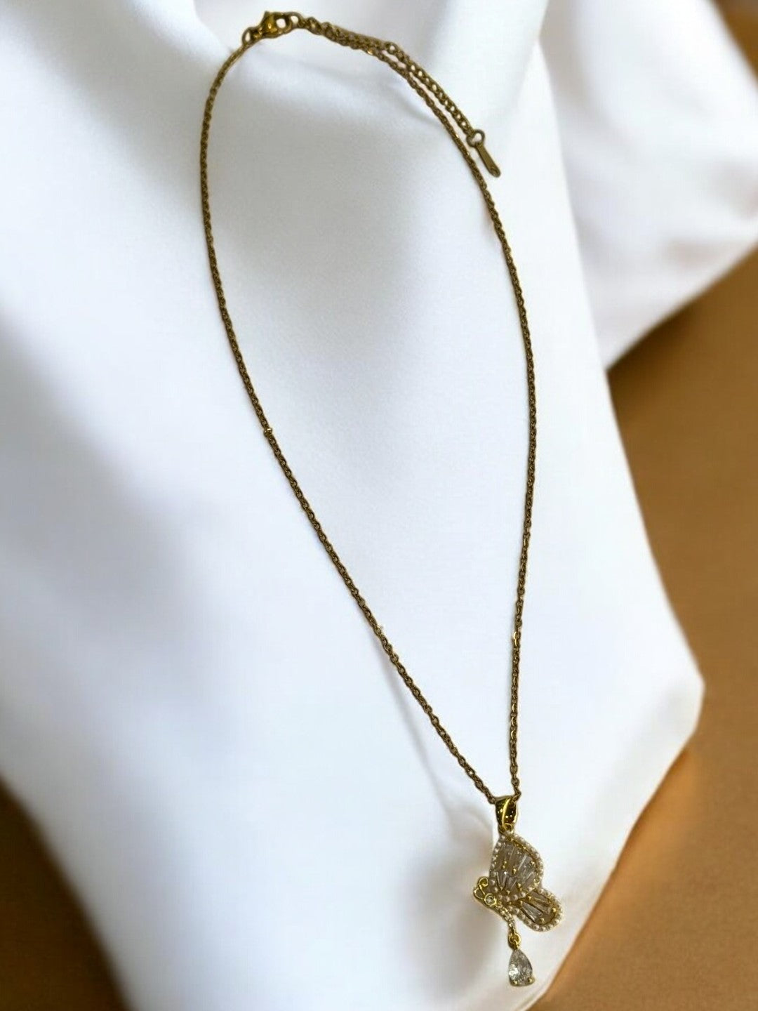 GOLDEN CHAIN WITH DIAMOND BUTTERFLY PENDENT