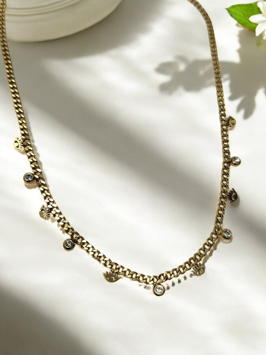 GOLDEN CHAIN WITH SHINY TINY HANGING DIAMOND AND EVIL EYE