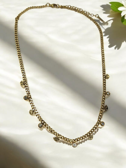 GOLDEN CHAIN WITH SHINY TINY HANGING DIAMOND AND EVIL EYE