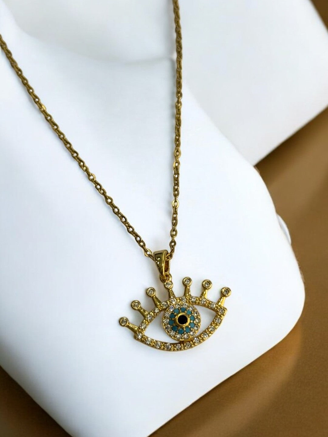 GOLDEN CHAIN WITH ROTATE EVIL EYE PENDENT