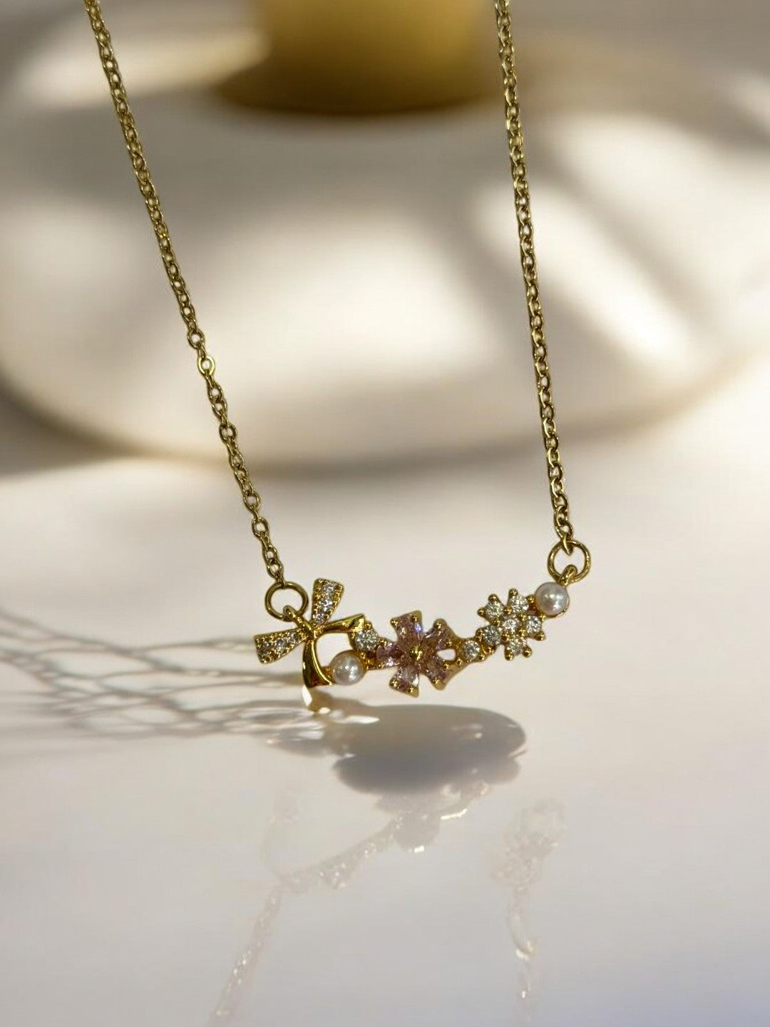 GOLDEN CHAIN WITH MULTI CHARMS PENDENT