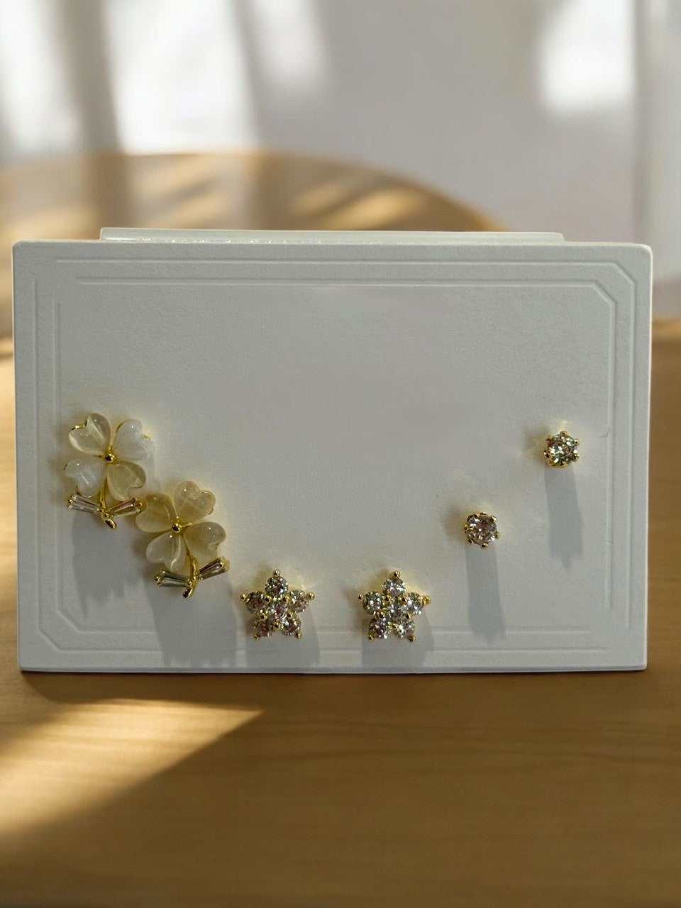 THREE PAIR OF EARRINGS