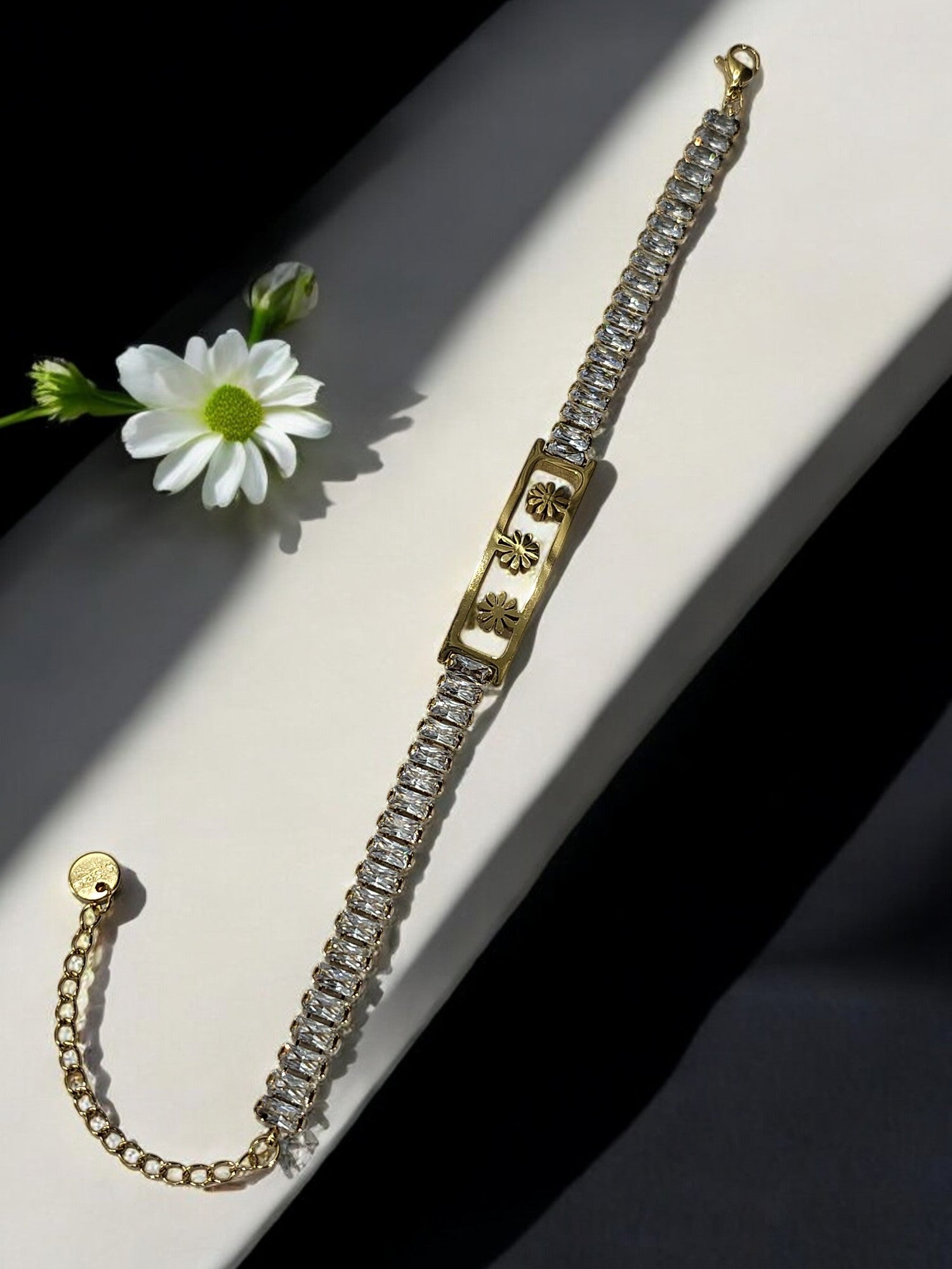 GOLDEN THREE FLOWER WITH RECTANGULAR SHINY DIAMOND