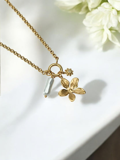 GOLDEN CHAIN WITH CHARMS LIKE FLOWER, PEARL AND DIAMOND