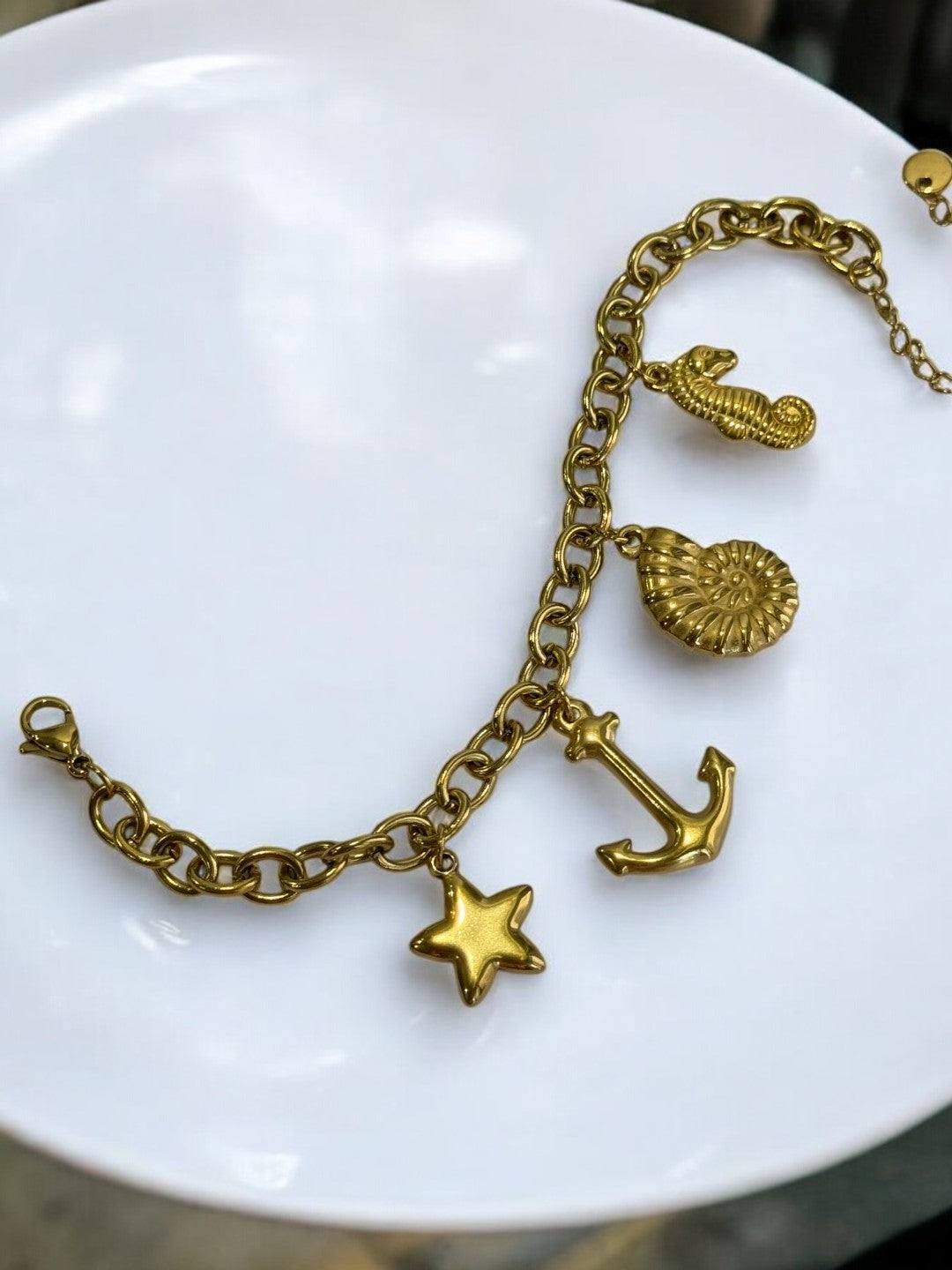 GOLDEN CHAIN BRACELET WITH CHARMS LIKE ANCHOR, STAR, SNAIL AND SEASHORE