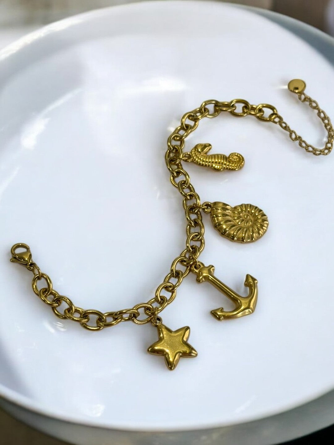 GOLDEN CHAIN BRACELET WITH CHARMS LIKE ANCHOR, STAR, SNAIL AND SEASHORE