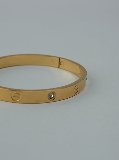 GOLDEN BASE WITH CARTIER AND DIAMOND 