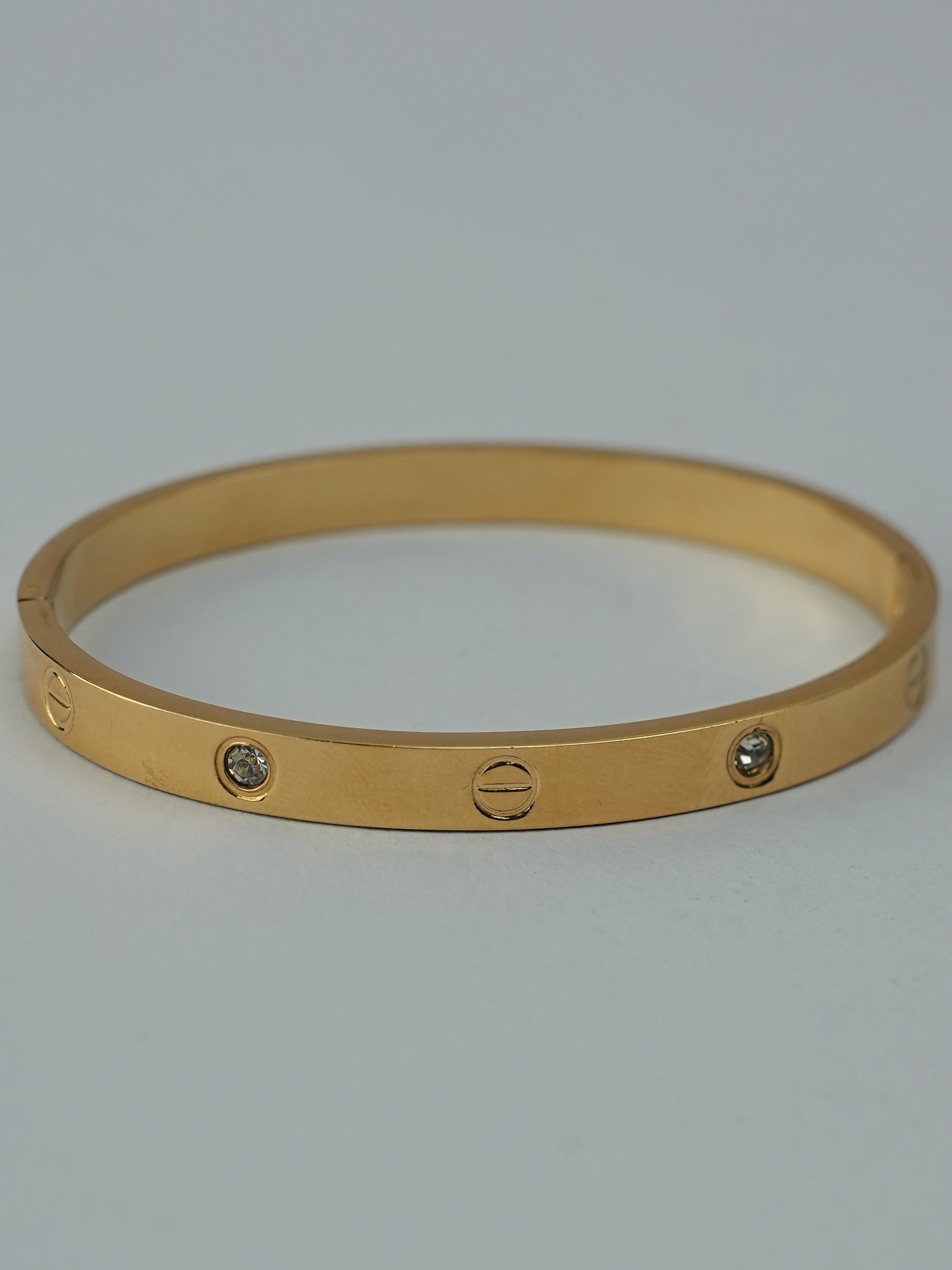 GOLDEN BASE WITH CARTIER AND DIAMOND 