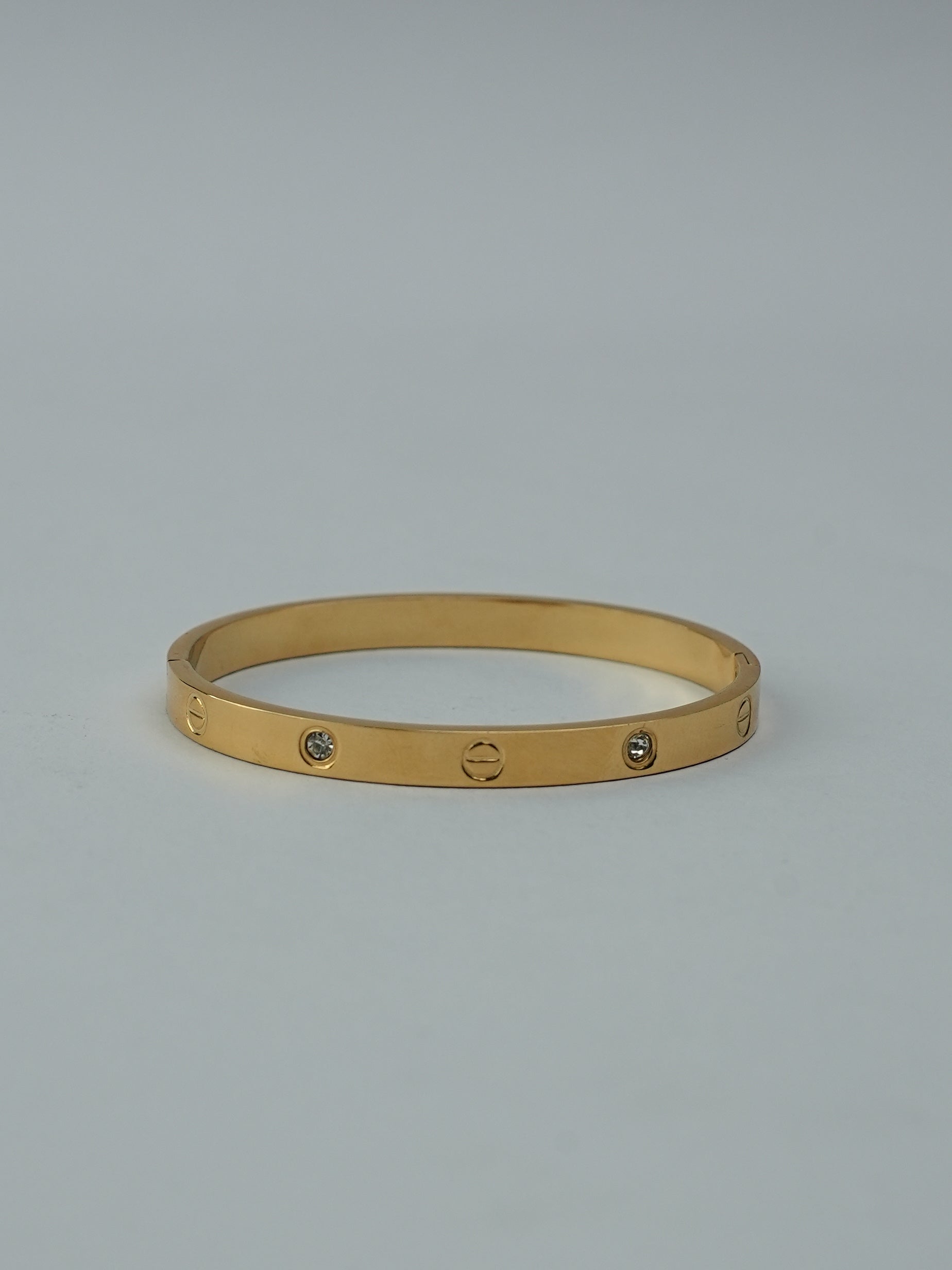 GOLDEN BASE WITH CARTIER AND DIAMOND 
