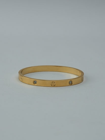 GOLDEN BASE WITH CARTIER AND DIAMOND 