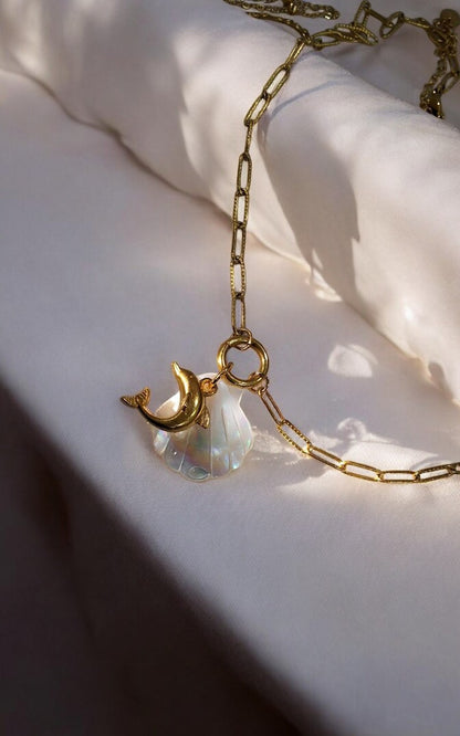 GOLD CHAIN WITH CHARMS LIKE GOLDEN DOLPHIN AND SEASHELL