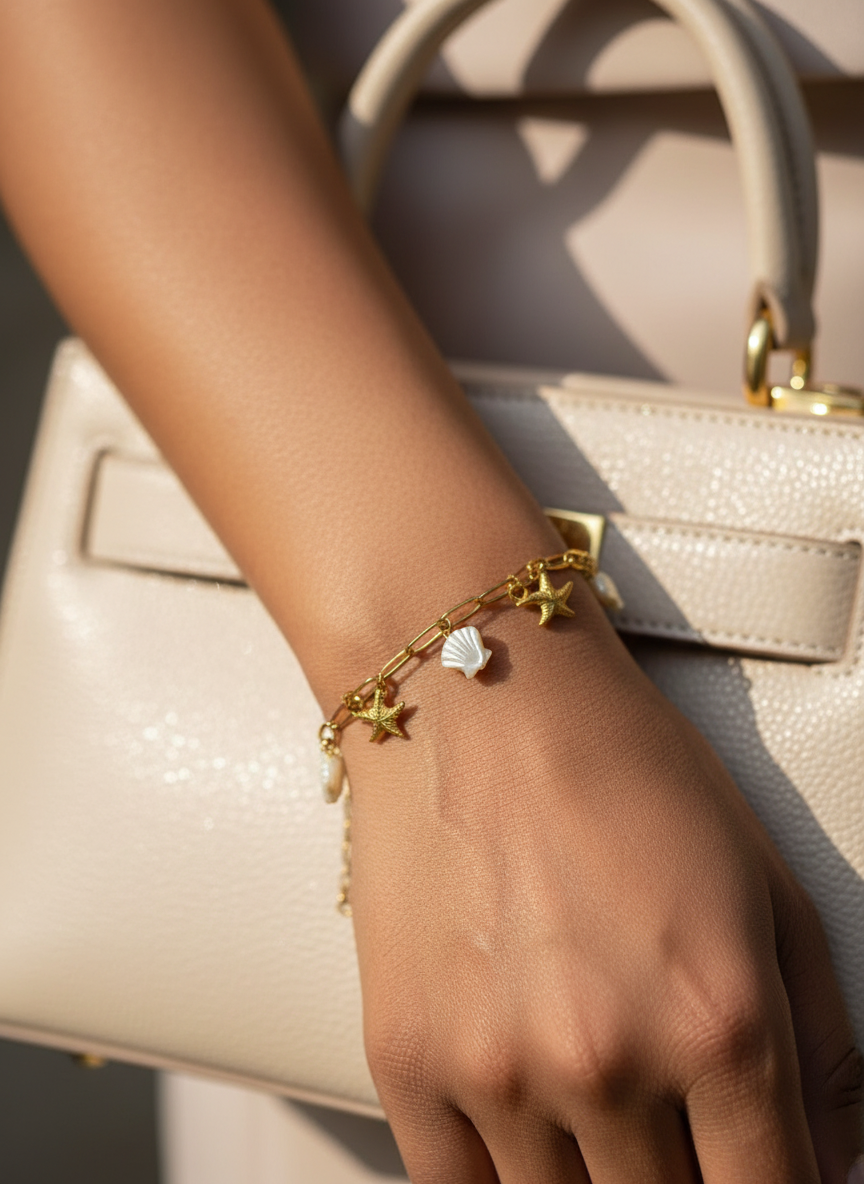 GOLD SEA SHELL STAR ITHSEY BRACELET