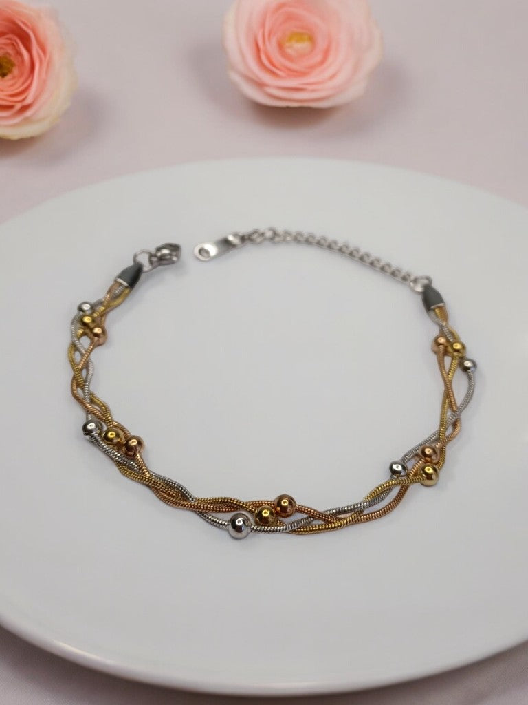 GOLD AND SILVER LAYERED WITH TINY BALLS