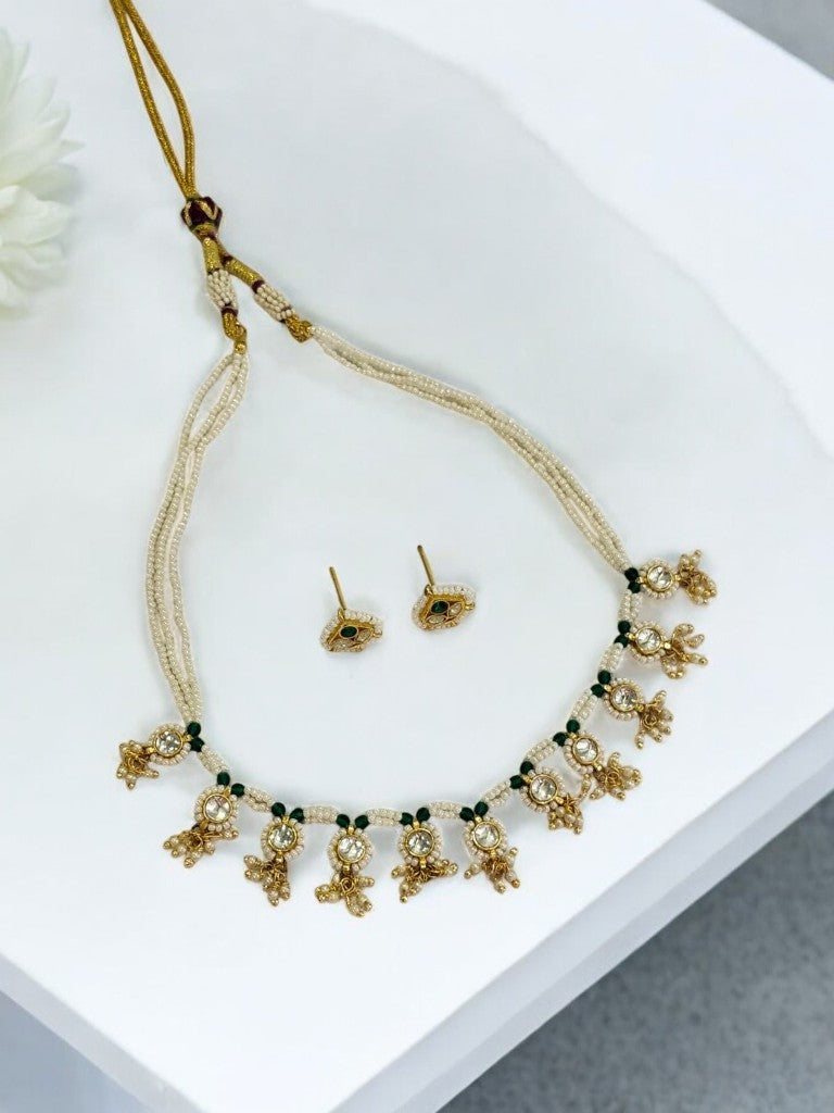 WHITE BEADS MALA WITH KUNDAN AND STUD EARRING