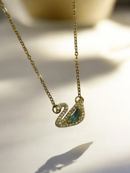 GOLDEN CHAIN WITH GREEN DIAMOND SWAN