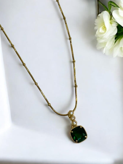 GOLDEN CHAIN WITH DIAMND AND GREEN SQUARE STONE 