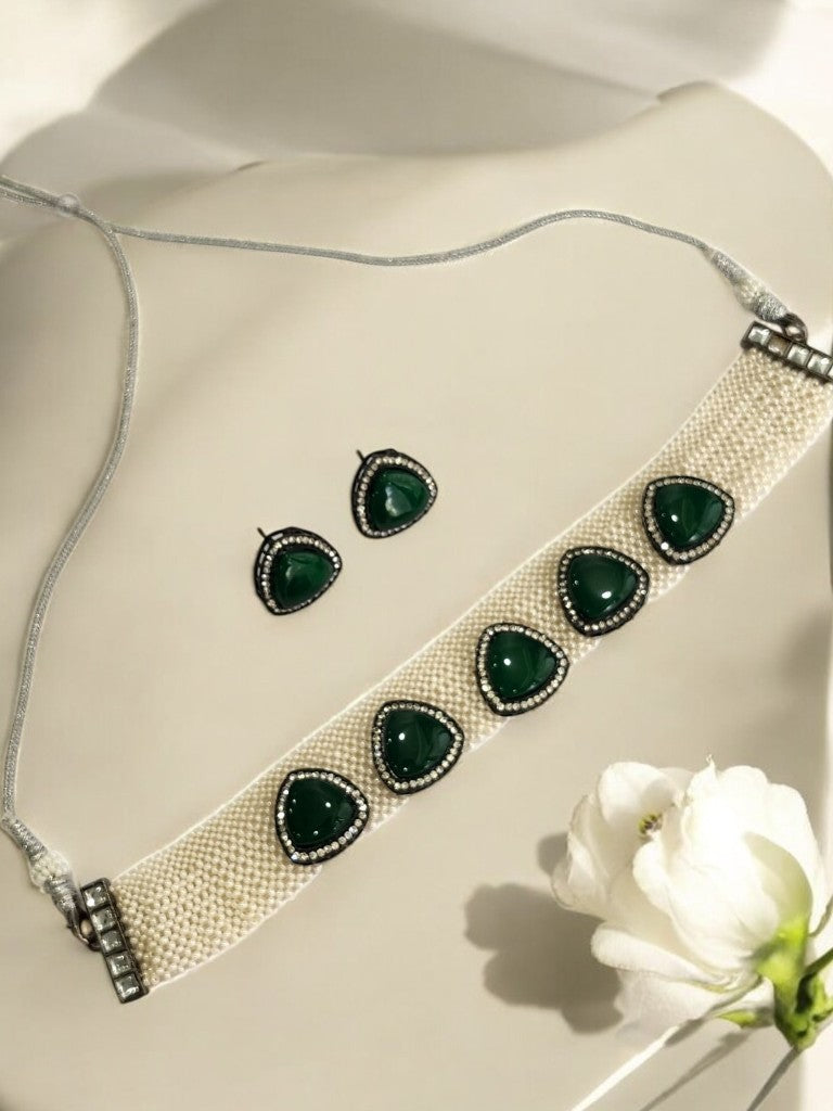 WHITE BEADS CHOAKR WITH GREEN TRIANGULAR STONE AND EARRING