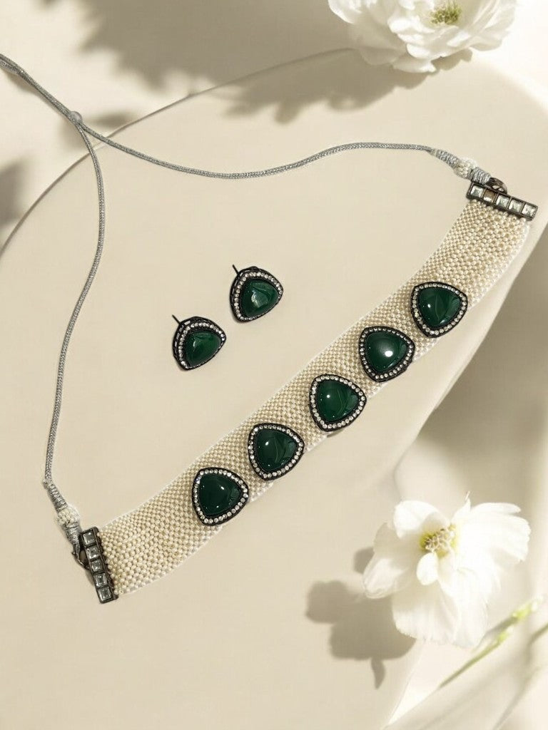 WHITE BEADS CHOAKR WITH GREEN TRIANGULAR STONE AND EARRING