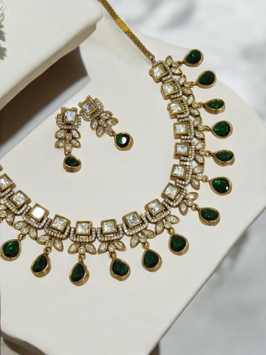 DIAMOND AND KUNDAN NECKLACE WITH GREEN HANGING STONE AND EARRING