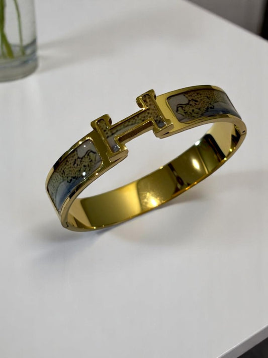 GOLDEN LEOPARD HERMES PAUL BRACELET