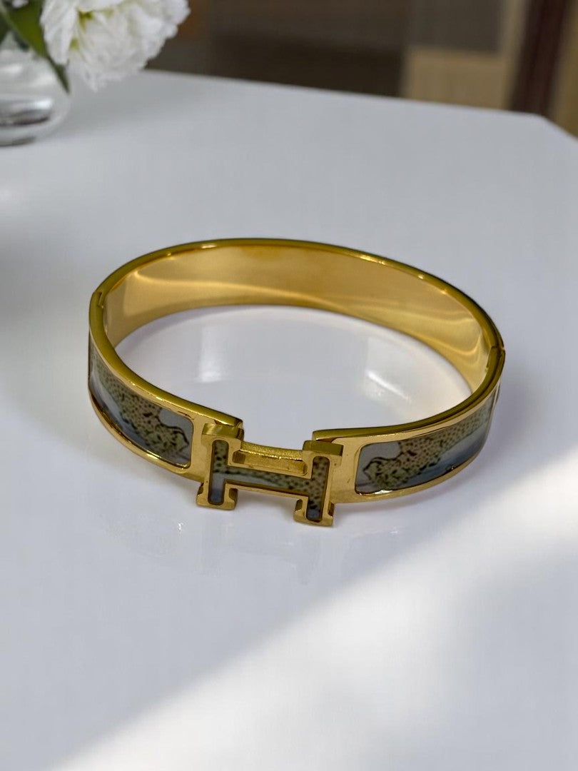 GOLDEN LEOPARD HERMES PAUL BRACELET