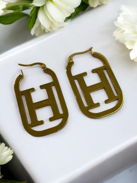GOLDEN HERMES SLOANE EARRINGS
