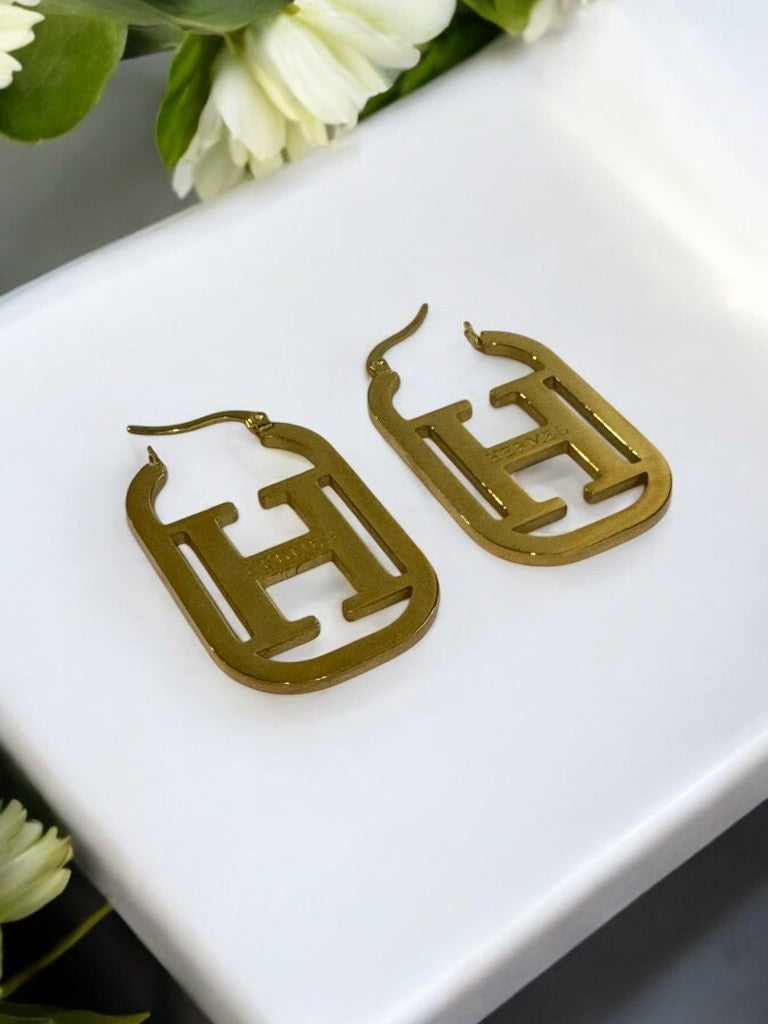 GOLDEN HERMES SLOANE EARRINGS
