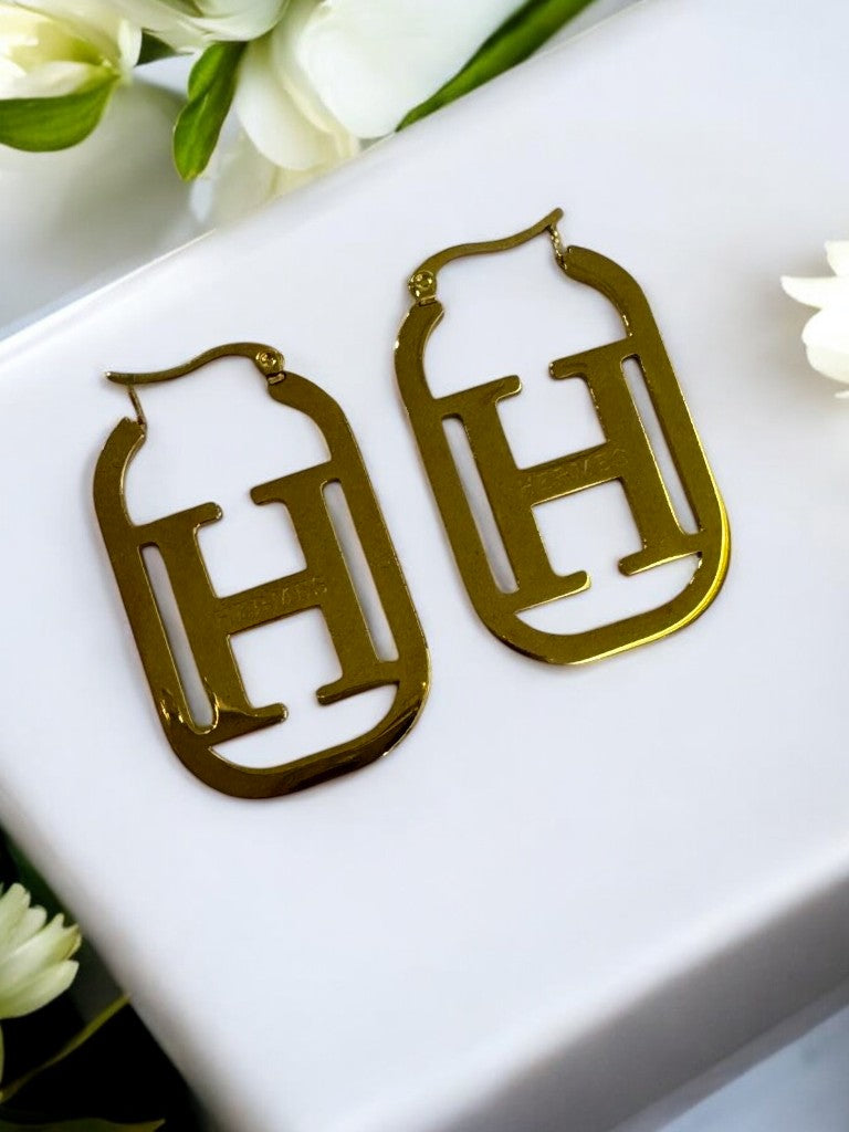 GOLDEN HERMES SLOANE EARRINGS
