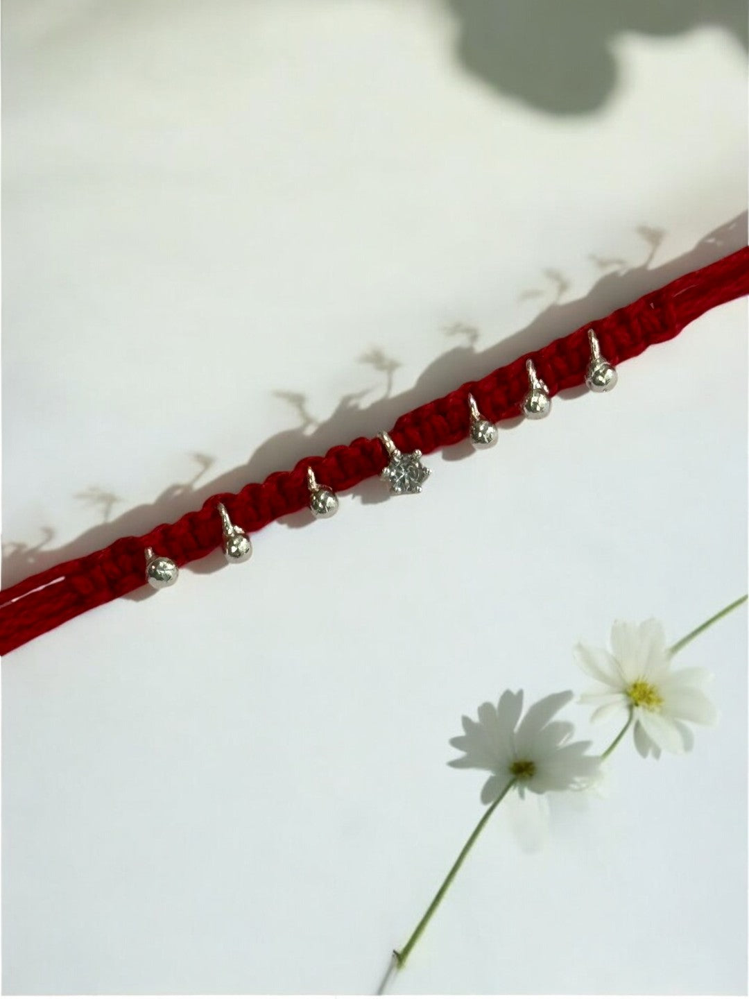 SINGLE DIAMOND SHRISHTI PURE SILVER RAKHI